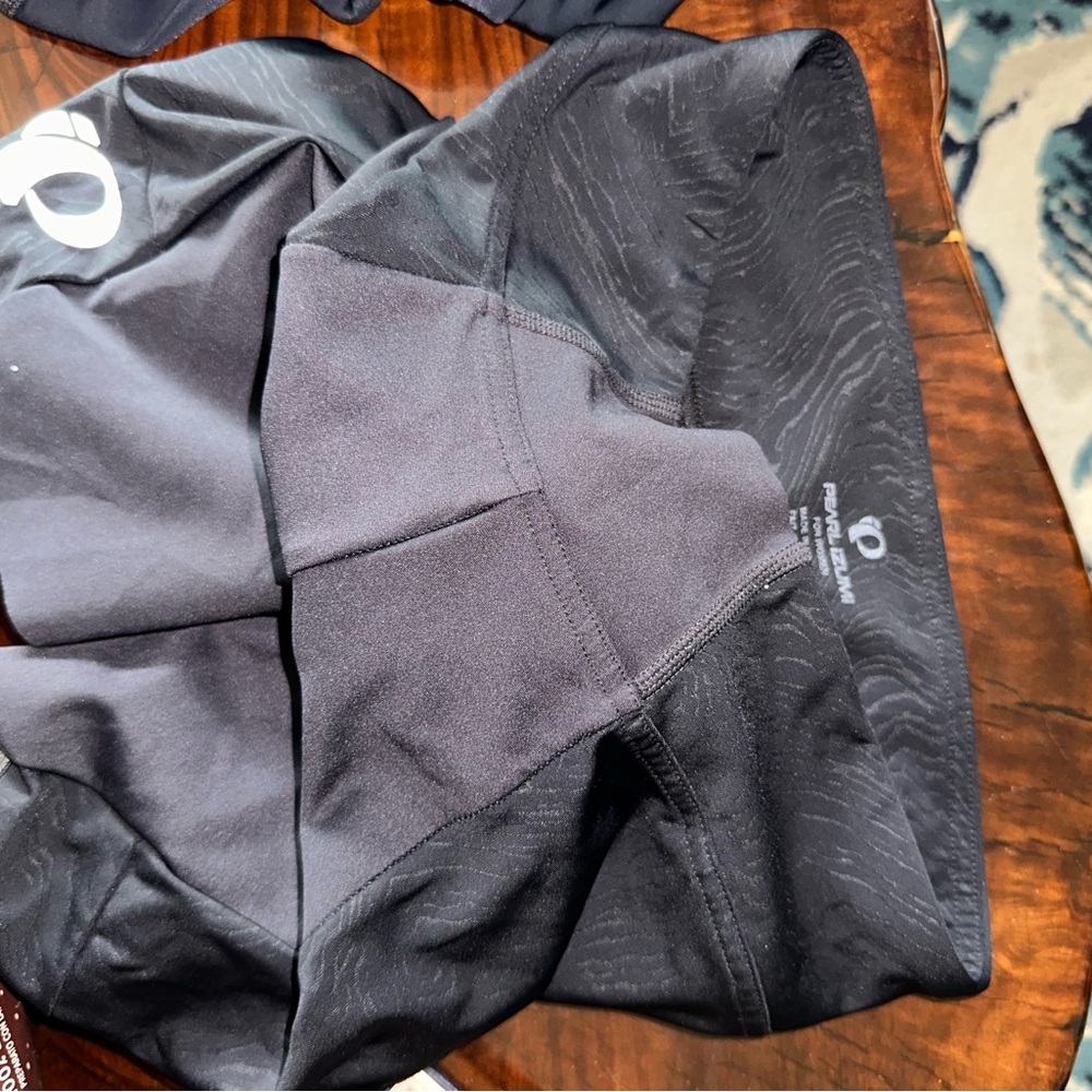 Pearl Izumi Black and Orange Cycling Gear (padded)